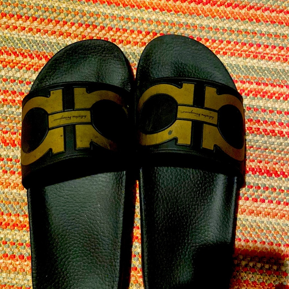 Salvadore Ferragamo slides black with gold